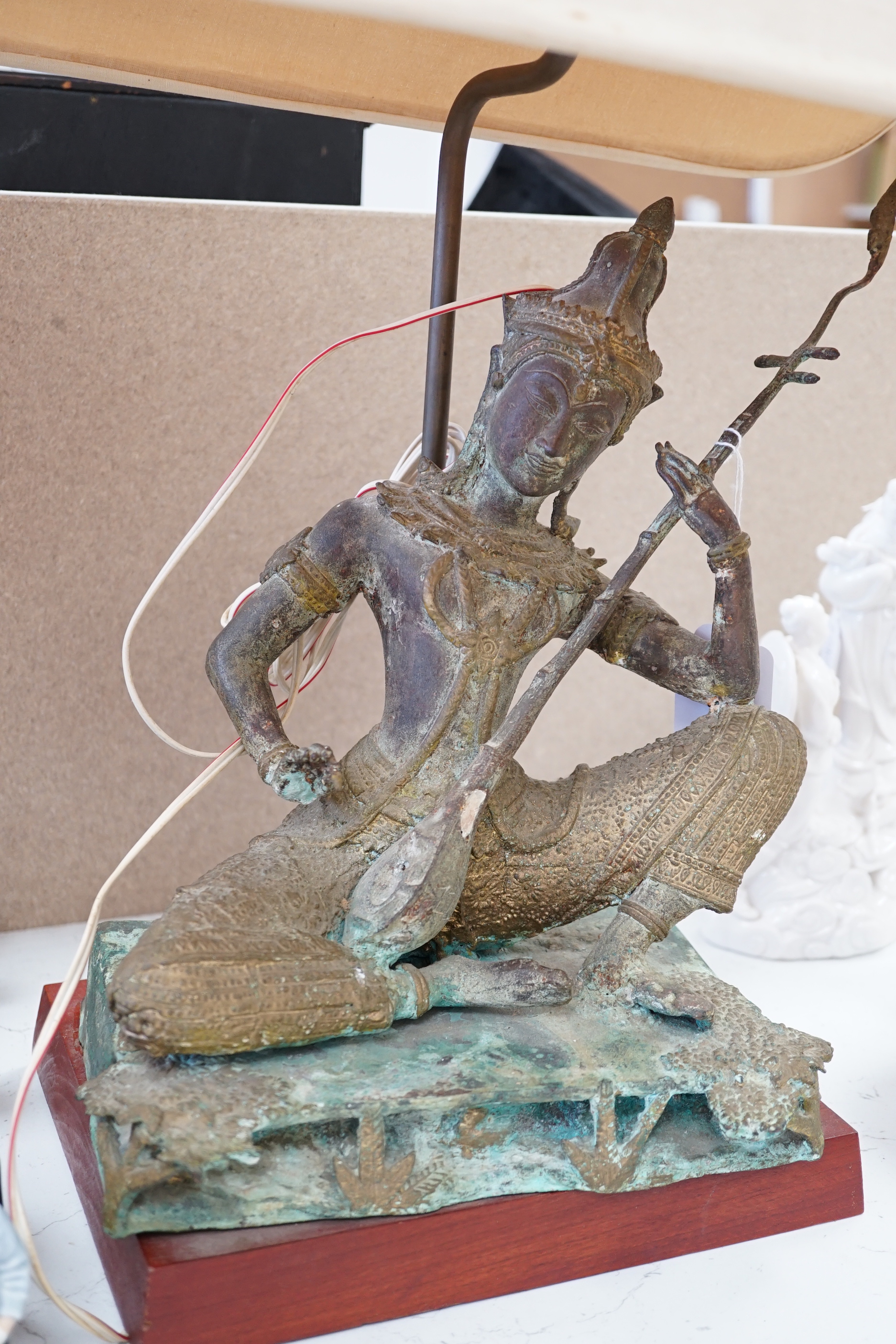 A Thai bronze figural table lamp, figure 36cms high